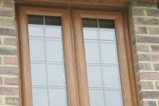 2-Casement-in-Golden-Oak-Woodgrain-with-2-Openers-Lead-Glass